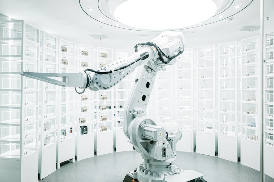 A robot gripper holding a hot tray fresh from a chamber