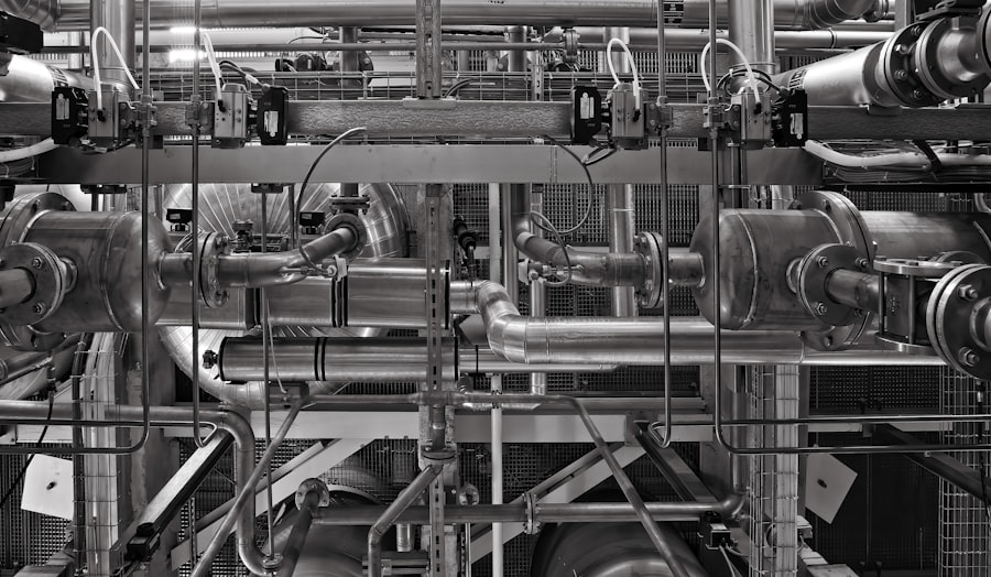 The transfer mechanism of a two-zone shock chamber moving a basket