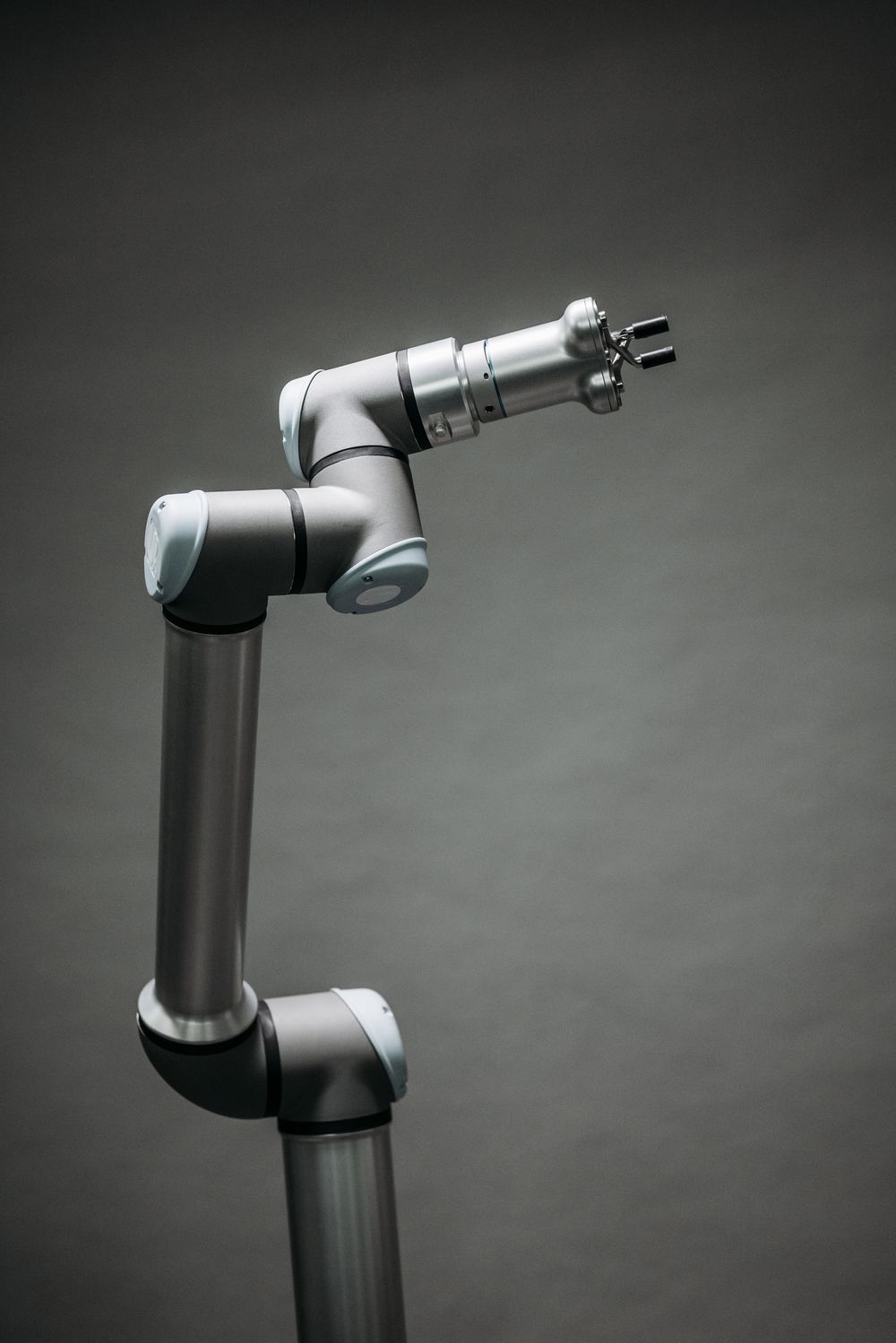 A collaborative robot arm with a gripper