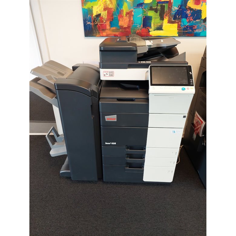 Floor-standing copier with a booklet-finishing unit attached