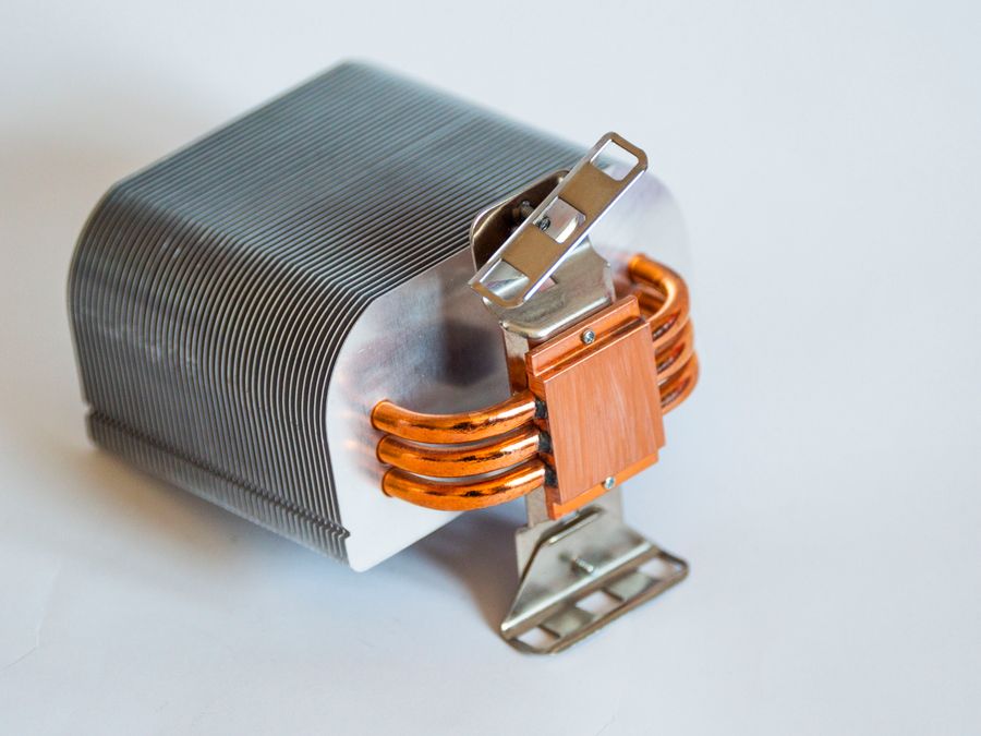 Heatsink with copper heat pipes and a copper contact block